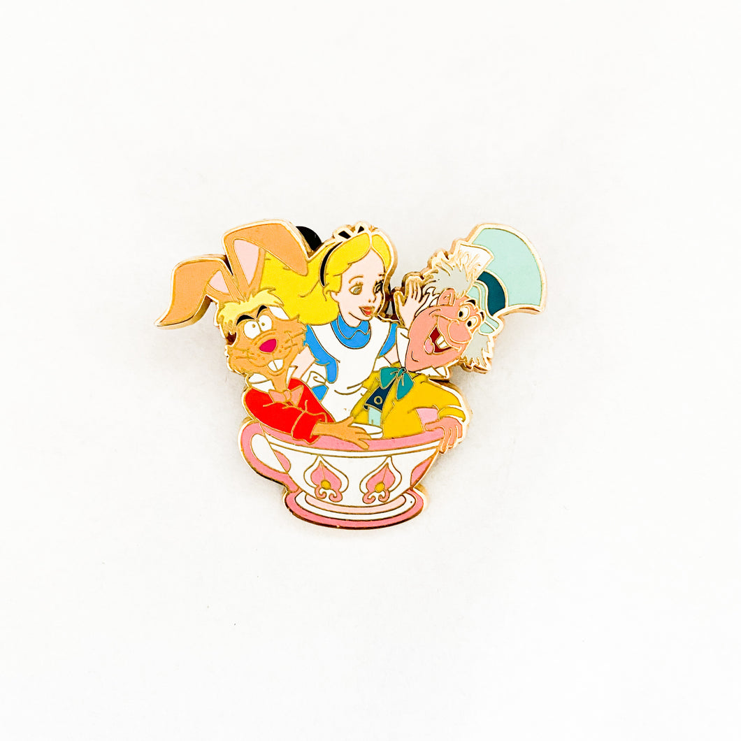 Alice, March Hare, and Mad Hatter Sitting In Teacup Pin
